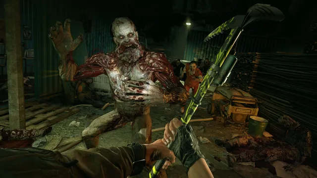 Dying Light screenshot: a bloated, bloody infected lunges at the player in a dark warehouse as the player raises a green-glowing weapon
