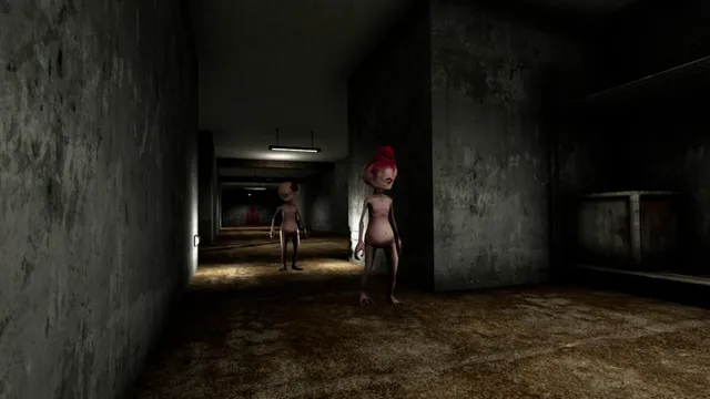 Two pale, naked humanoid figures stand in a dim, dirty concrete corridor