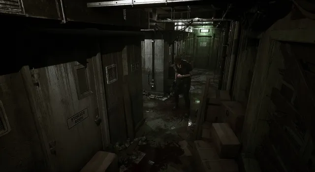A bloodstained basement corridor with a storage room door and an emergency exit sign, seen from a fixed camera