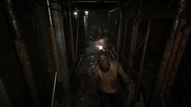 Liam shoots a zombie at close range in a narrow scaffolded alley, blood spraying
