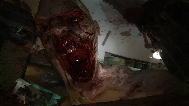 A blood-covered, mutated creature lunges at the camera with its mouth open in a dark hospital room