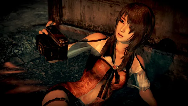 Fatal Frame: Maiden of Black Water screenshot: Yuri on the ground at night, holding up the old camera