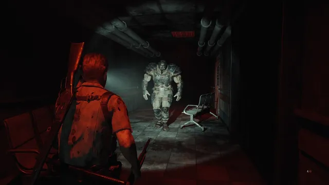 Fear The Timeloop screenshot: the sheriff in a red-lit hospital corridor as a hulking armoured brute walks toward him