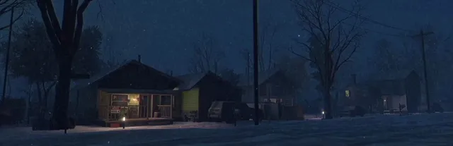 A snowy small-town street at night with lit wooden houses and bare trees