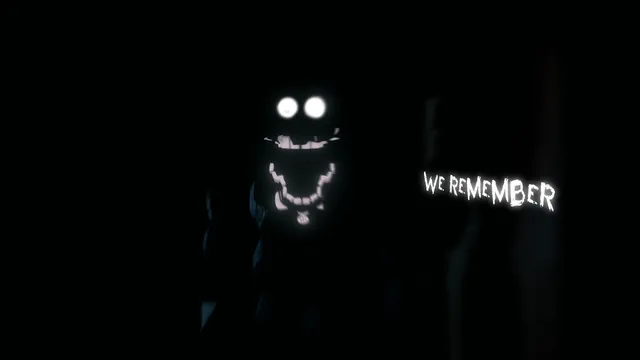 Glowing eyes and teeth in the dark beside the words We remember