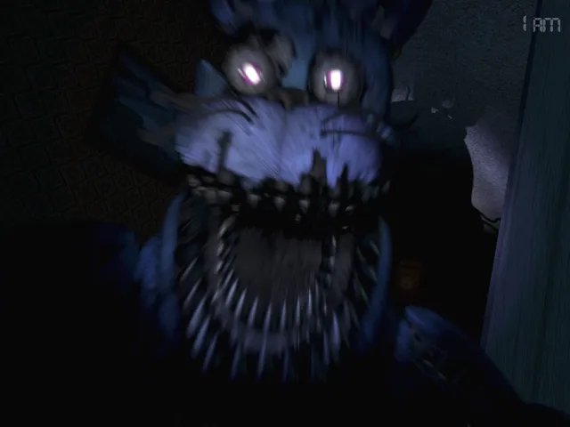 Five Nights at Freddy's 4 screenshot: a blue nightmare Bonnie with glowing eyes and a mouth full of teeth lunges out of the dark