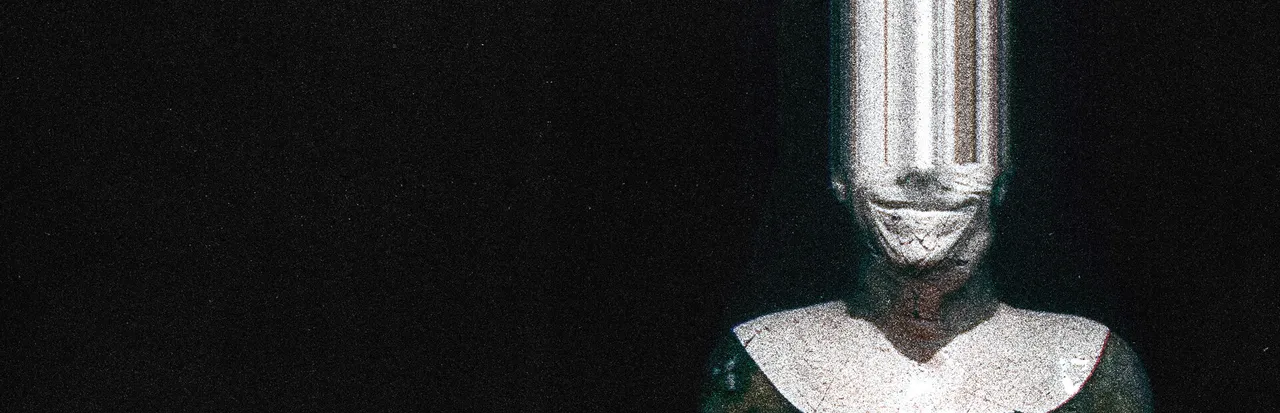FLATHEAD key art: a grainy grinning figure in a white collar whose head is a blur of static