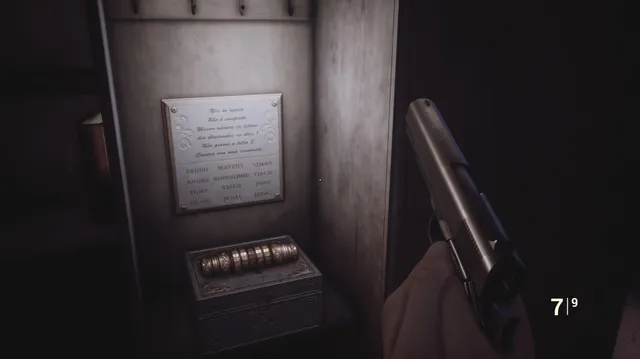 Fobia - St. Dinfna Hotel screenshot: a metal plaque of riddles and names above a box with a letter combination lock, the player holding a pistol