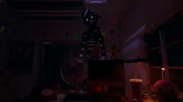 Forgotten At Fredbear's screenshot: the night guard's office with a desk fan, a red phone and an old computer, a striped animatronic looming behind