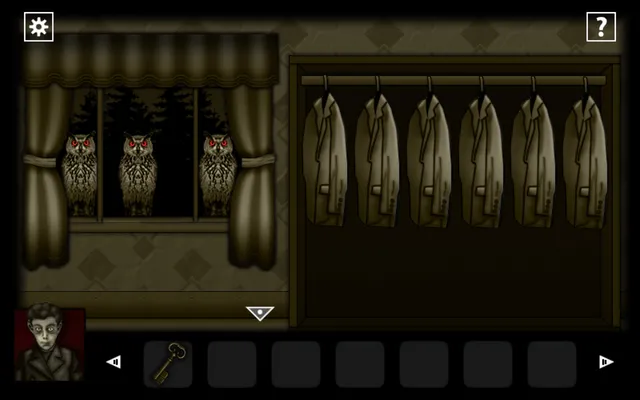 Three red-eyed owls stare through a window beside a rail of hanging coats