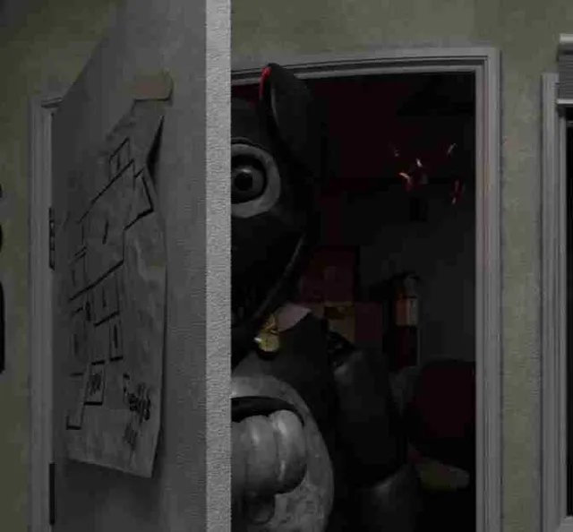 A dark bear animatronic leans in through the office doorway
