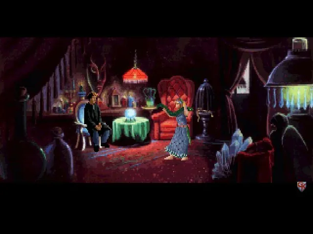 Gabriel Knight: Sins of the Fathers screenshot: Gabriel seated at a crystal ball in a dim red fortune-teller's parlour