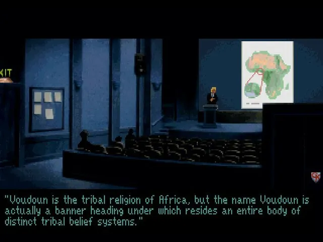 Gabriel Knight: Sins of the Fathers screenshot: a lecture hall with a map of Africa as a professor speaks about Voudoun