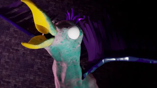 A blotchy teal bird mascot with a yellow beak and purple wings looming in the dark