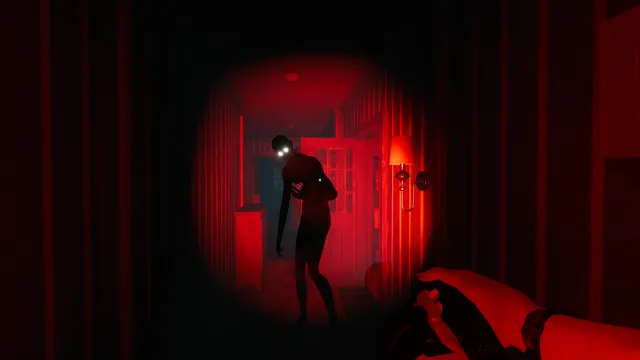 Ghost Watchers screenshot: a thin dark figure with glowing white eyes stands at the end of a red-lit hallway, caught in the flashlight's circle