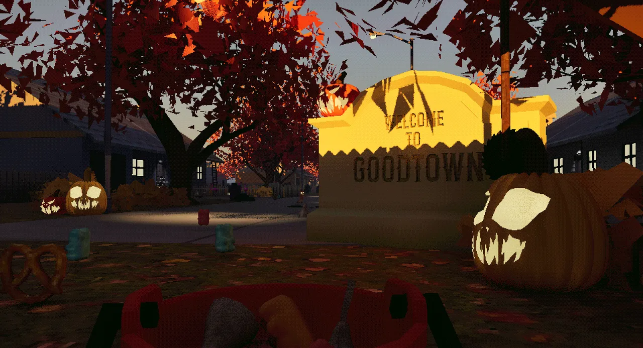 The Welcome to Goodtown sign beside grinning jack-o'-lanterns and red autumn trees, seen over a candy bucket
