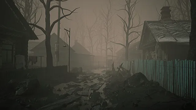A muddy village lane between wooden houses and bare trees in fog