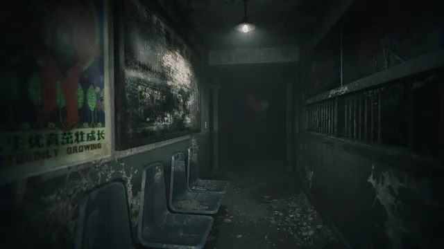 A decayed hospital corridor of blue plastic waiting chairs under faded posters with Chinese text