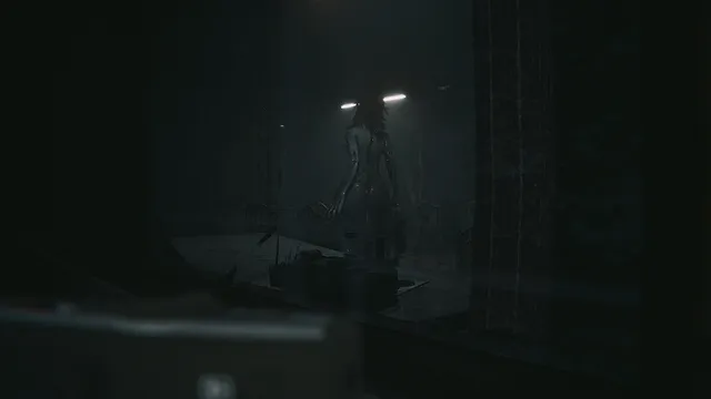 A tall, thin figure standing in a dark room under two ceiling lights