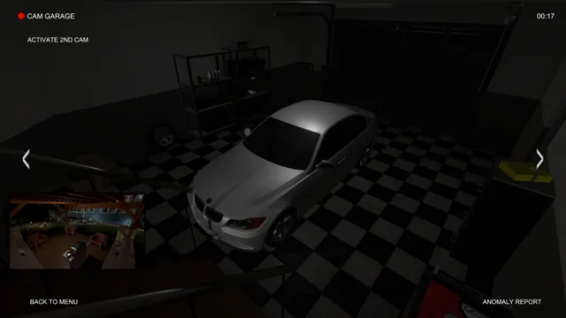 Camera view of a garage with a white car on a chequered floor and a second camera picture in the corner