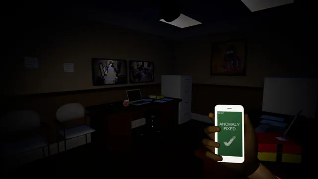 A dark office with chairs and framed pictures, a phone in hand showing Anomaly fixed