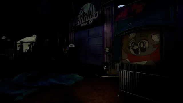 Indigo Park screenshot: the closed park gate at night behind barriers, with a faded raccoon mural on the wall