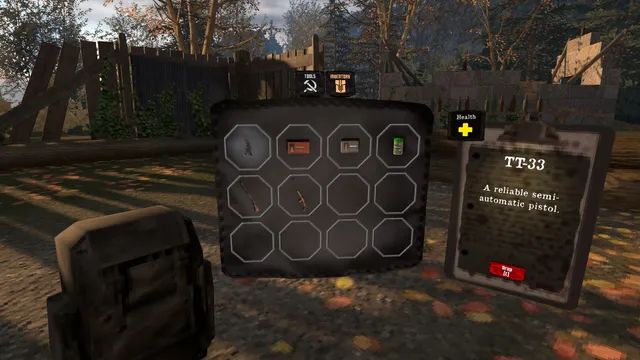 The in-game grid inventory held open in front of the player, with a TT-33 pistol described on a tag