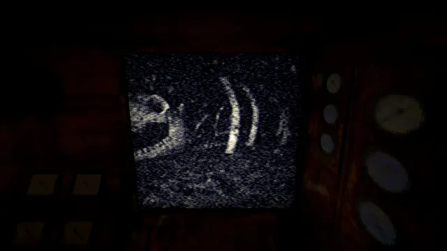 Iron Lung screenshot: a grainy black-and-white photograph on the sub's screen shows a skull-like shape and curved ribs in the dark