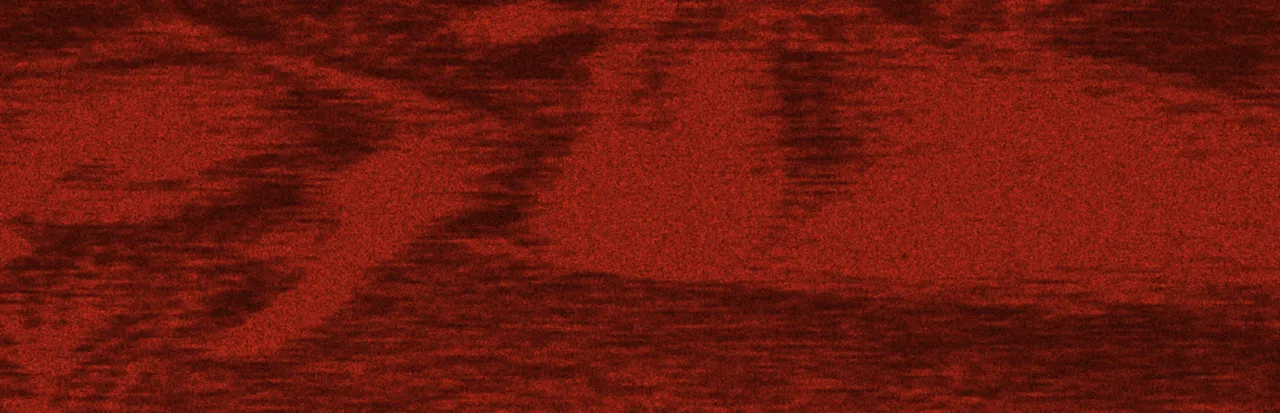 Iron Lung art: the grainy red surface of an ocean of blood
