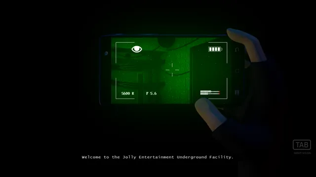 JOLLY 3: Chapter 2 screenshot: a hand holds a phone in green night vision, with the words Welcome to the Jolly Entertainment Underground Facility