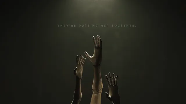 Mannequin arms and hands reach up under a spotlight, with the words 'They're putting her together.'
