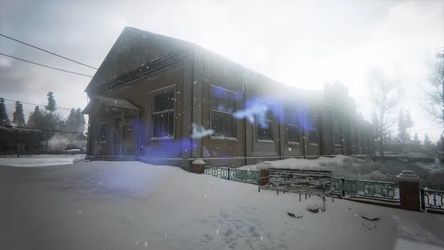 Kholat screenshot: an old wooden building in the snow with blue lights glowing at its windows