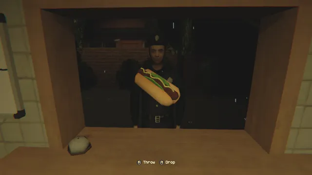 A police officer waits at the kiosk window at night as the player holds out a hot dog