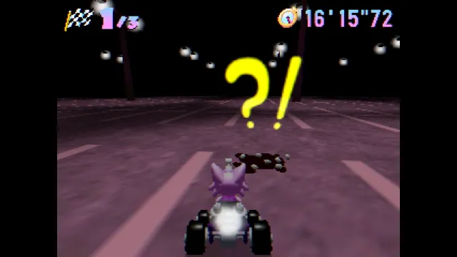 Kitty Kart 64 screenshot: a yellow question and exclamation mark over the kart on a dark road with floating lights