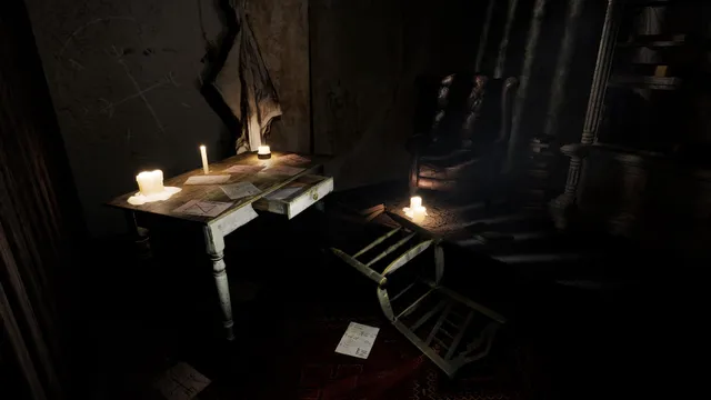 A candlelit table with scattered cards and an overturned chair in a dark room