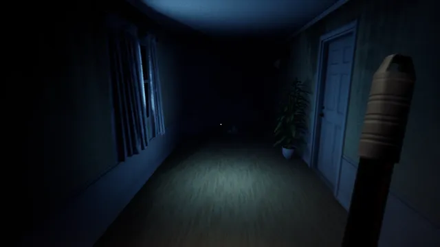 First-person view holding a mop handle in a dark hallway beside a closed door