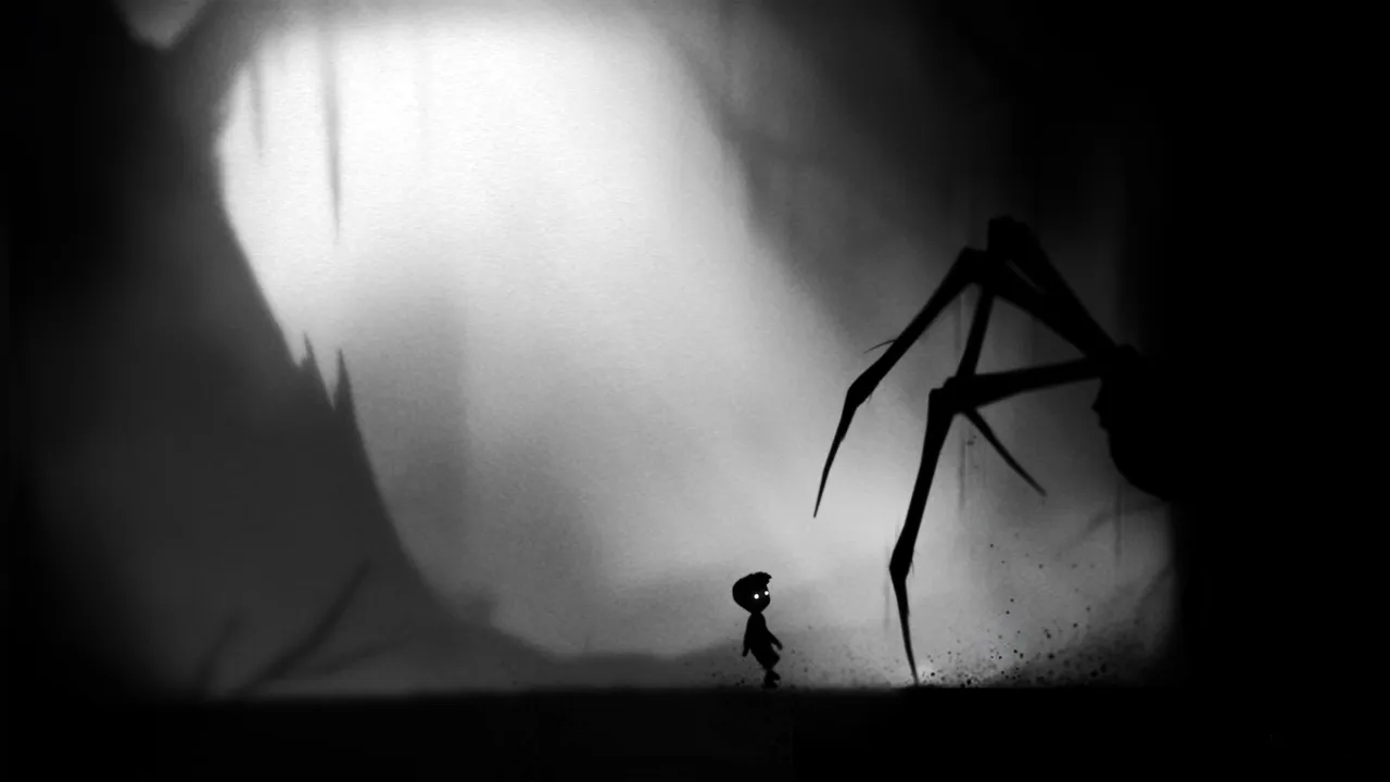 LIMBO: the silhouetted boy stands in a bright clearing as the long legs of a giant spider reach down beside him