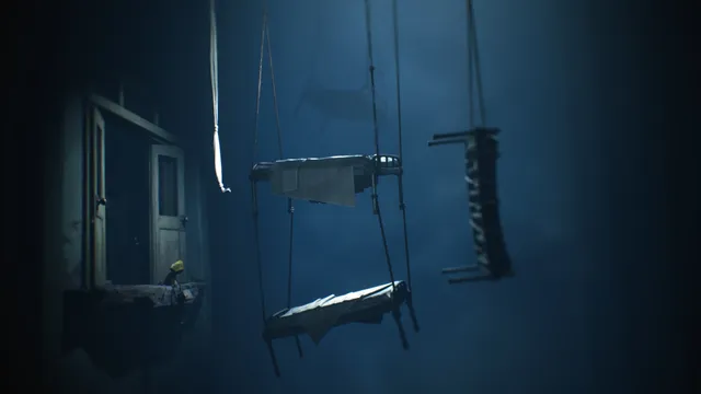 Six in her yellow raincoat crouches at a broken doorway beside hospital beds hanging on ropes in a dark blue void