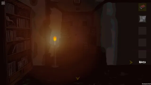 A single candle lighting a gloomy room lined with bookshelves