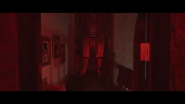 A hallway bathed in red light with a hooded figure standing at the far end