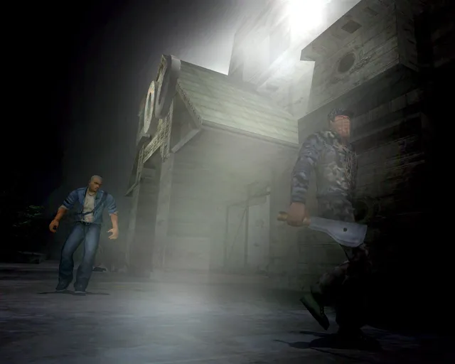 Manhunt screenshot: Cash crouches in a foggy street at night as a hunter with a scarf over his face walks past carrying a machete