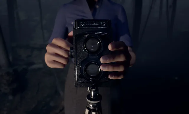 Martha Is Dead screenshot: a woman's hands hold an old twin-lens Rolleicord camera on a tripod