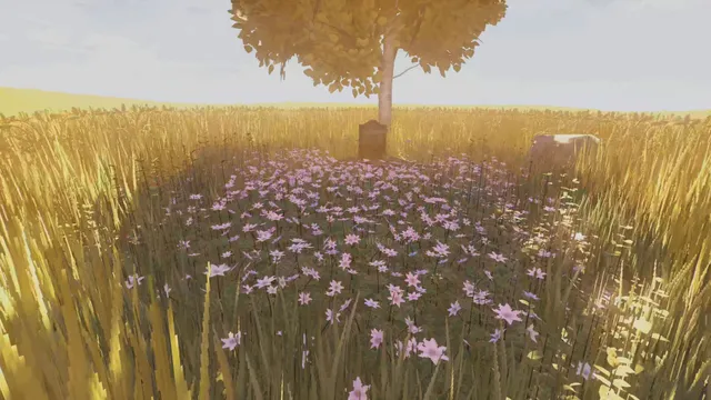 MOLE screenshot: a field of golden grass and pink flowers around a gravestone beneath a tree