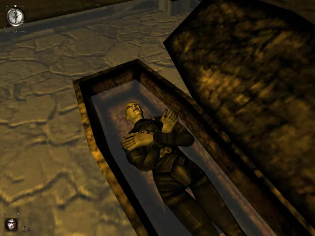A pale vampire lies with crossed hands in an open coffin on a stone crypt floor