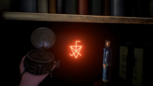 Notes of Obsession screenshot: a glowing orange symbol on a dark bookshelf next to the music box and a small figurine