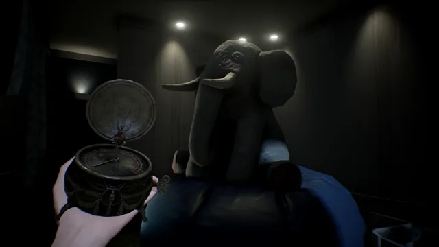 Notes of Obsession screenshot: a hand holding an open music box beside a large stuffed elephant in a dark bedroom
