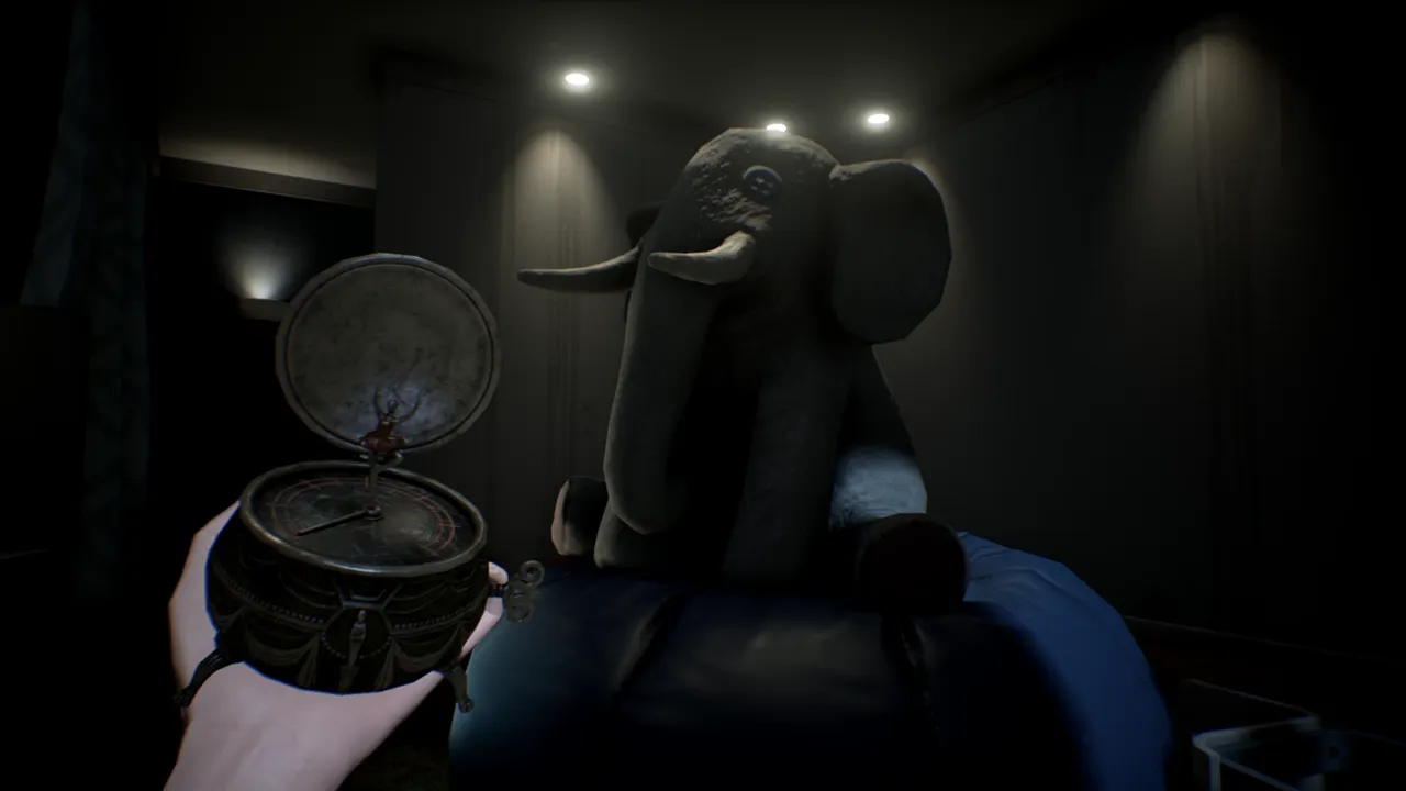 Notes of Obsession screenshot: a hand holding an open music box beside a large stuffed elephant in a dark bedroom