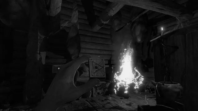 A hand reaching for a matchbox by a fire inside a dark log hut, a pot hanging nearby