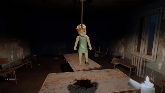 Palmyra Orphanage: a child's doll hangs from a noose over a bloodstained table in a dark classroom