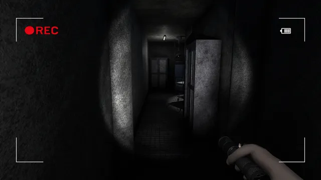 Paranormal Entities screenshot: the flashlight beam picks out a narrow corridor with lockers in the asylum